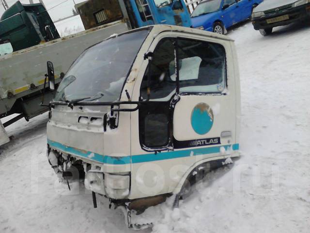 Ниссан атлас по докам 2000 год купил кабину.двигатель.коробку и задний Ниссан атлас по докам 2000 год купил кабину.двигатель.коробку и задний