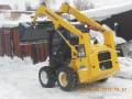 Komatsu SK815. Фронтальный мини погрузчик коматсу 815, 3 000 куб. см.