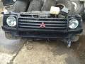 Решетка радиатора. Mitsubishi Pajero, V24V, V24WG, V26WG, V47WG, V26C, V25C, V24C, V23C, V43W, V44W, V45W, V46W, V14V, V26W, V25W, V24W, V34V, V23W, V...