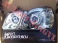 Фара. Toyota Land Cruiser Cygnus, UZJ100W Lexus LX470