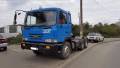 Hyundai HD. Хундай-седельный тягач с полуприцепом-контейнеровозом, 11 149 куб. см., 25 300 кг.