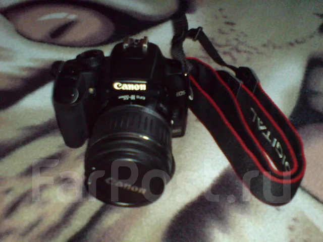 Canon EOS 1000D kit. 10 - 14.9 �� ����
