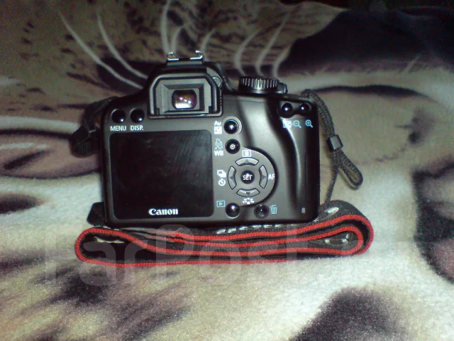 Canon EOS 1000D kit. 10 - 14.9 �� ����