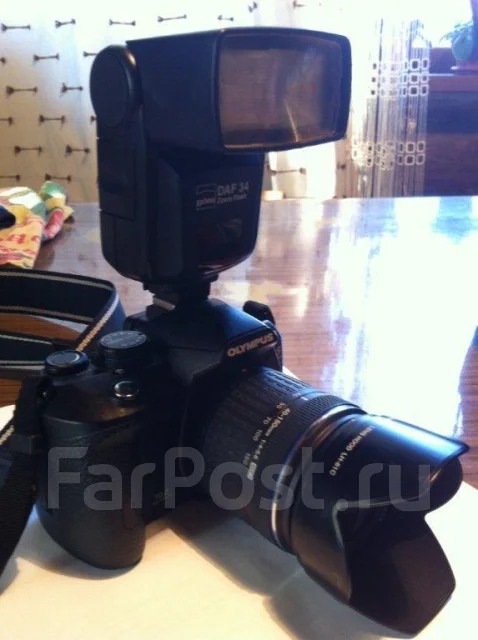 Olympus E-520 Kit. 10 - 14.9 �� ����