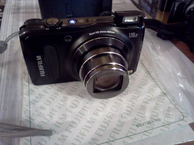 Fujifilm FinePix F300EXR. 10 - 14.9 �� ����