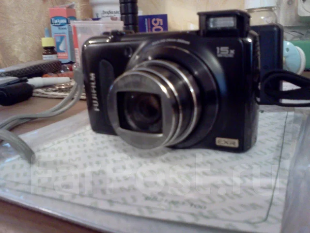 Fujifilm FinePix F300EXR. 10 - 14.9 �� ����