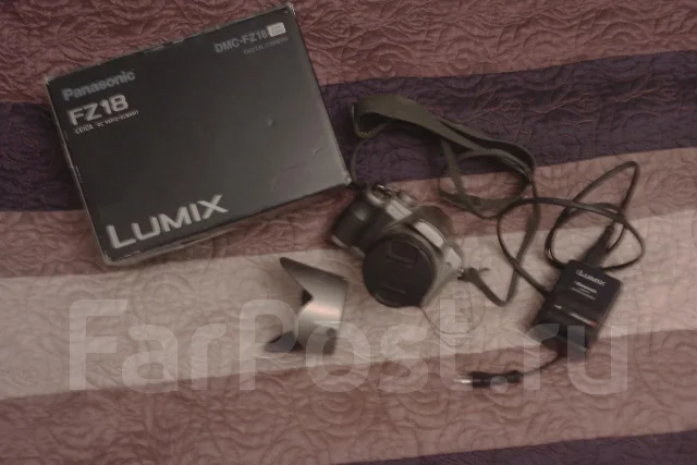 Panasonic Lumix DMC-FZ18. 8 - 8.9 �� ����