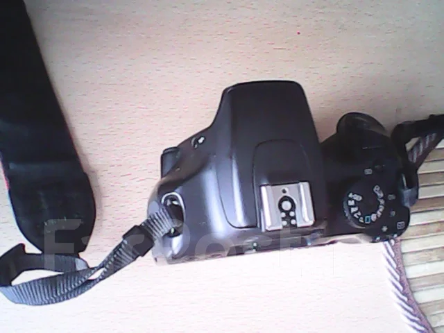 Canon EOS 1000D body. 10 - 14.9 �� ����