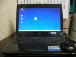 ASUS K40IN. 14", 2,0 ���, ��� 2048 ��, ���� 250 ��, WiFi, ����������� �� 4 �.
