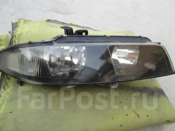 правая фара nissan skyline 1533