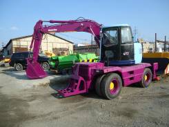 Komatsu PW128UU. Экскаватор колесный -1, 0,50 куб. м.