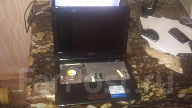 ASUS K40IJ. 1,8����, ��� 2048 ��, WiFi: 1, Bluetooth: 1 ����