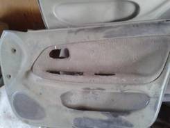 Обшивка двери. Toyota Sprinter