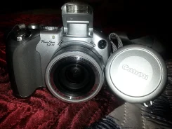 Canon PowerShot S3 IS. 6 - 6.9 ��, ���: 12� ����