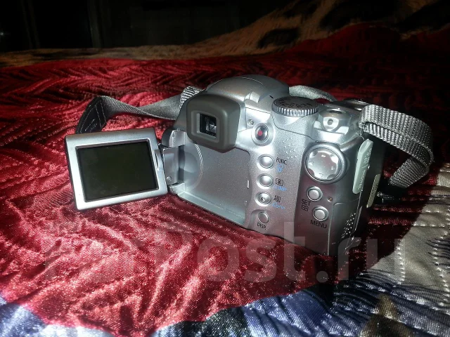 Canon PowerShot S3 IS. 6 - 6.9 ��, ���: 12� ����