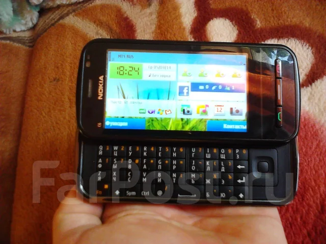 Nokia C6-00 ����