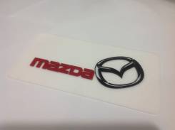 Табличка. Mazda