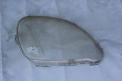 Стекло фары. Toyota Yaris Toyota Vitz