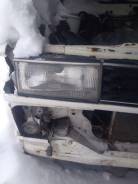 Фара. Nissan Bluebird