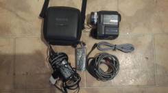 Sony DCR-PC330. Менее 4-х Мп, с объективом