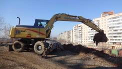 New Holland. Колёсный экскаватор EW160, 0,70 куб. м.