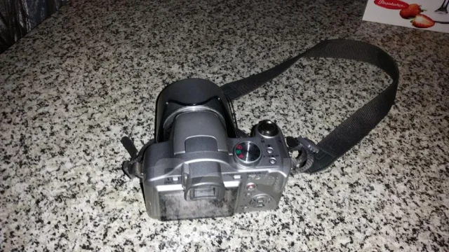 Panasonic Lumix DMC-FZ8. 7 - 7.9 ��, ���: 12� ����