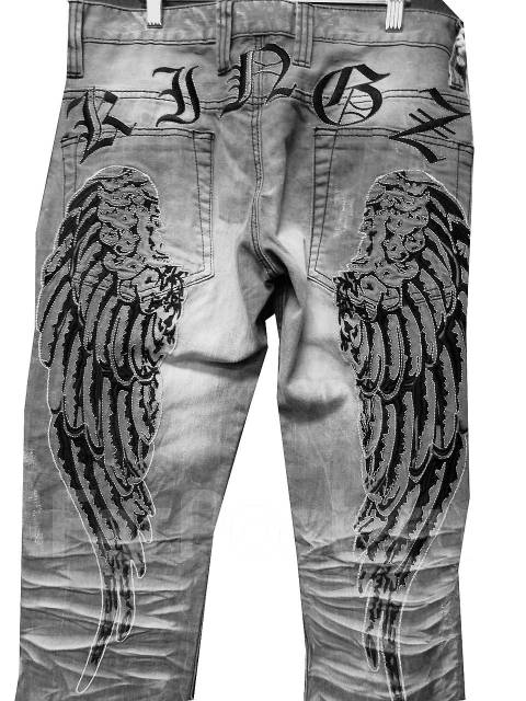 Джинсы с крыльями