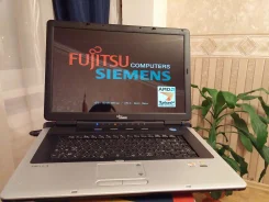 Fujitsu AMILO. 1,8����, ��� 768 ��, ���� 10���, WiFi, ����������� �� 1��.