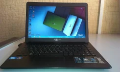 Asus X401A. 1,7����, ��� 2048 ��, ���� 320���, WiFi: 1, Bluetooth: 1, ����������� �� 24��. ����
