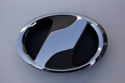 Эмблема решетки (или предней панели) Toyota Auris
