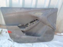 Обшивка двери. Ford Focus