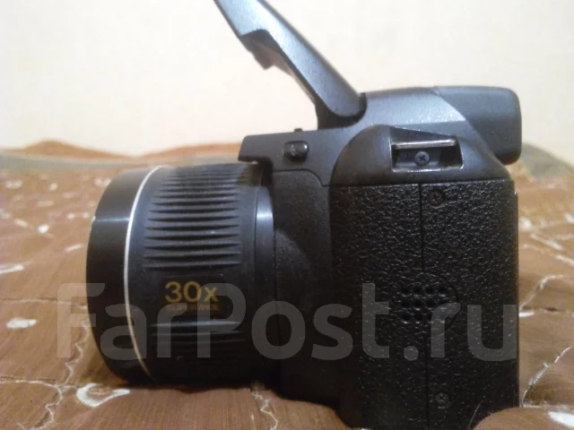 Fujifilm FinePix S4000. 10 - 14.9 ��, ���: 14� � ����� ����