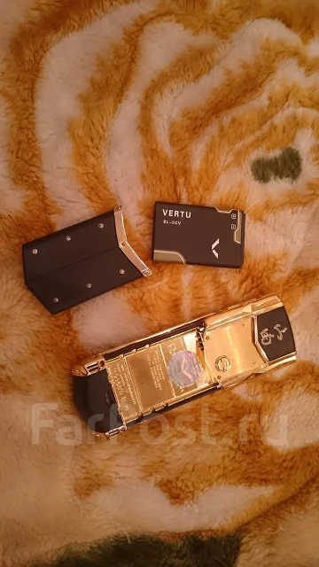 Vertu Signature. �/� ����