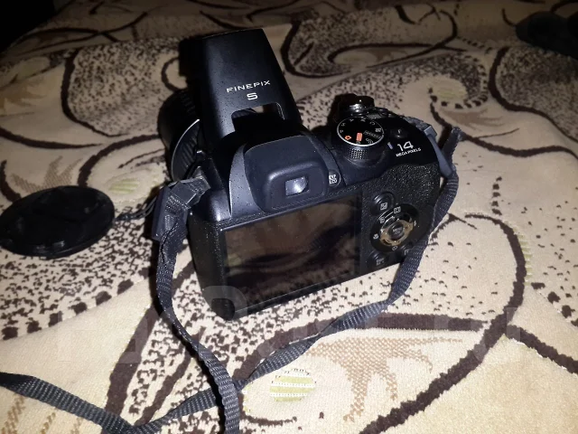 Fujifilm FinePix S4000. 10 - 14.9 ��, ���: 14� � ����� ����