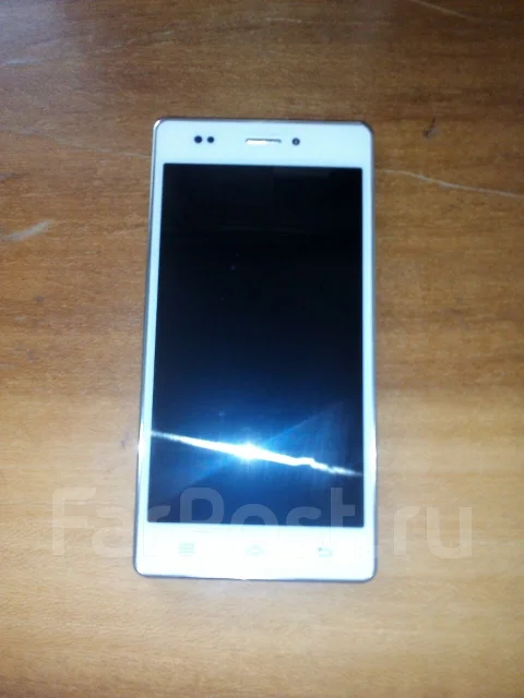DEXP Ixion M 5 ����