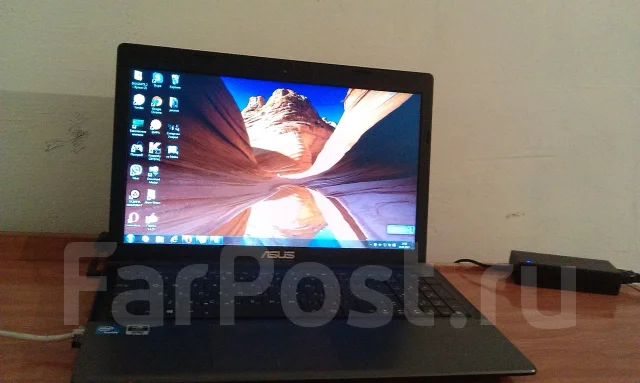 Asus X55VD. 2,3����, ��� 4 ��, ���� 320���, WiFi: 1, Bluetooth: 1, ����������� �� 1��. ����