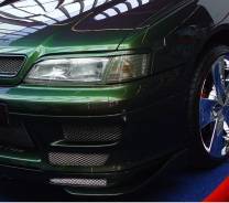 Накладка на фару. Nissan Primera, HNP11