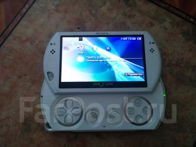 Sony PlayStation Portable Go PSP-N1000 ����