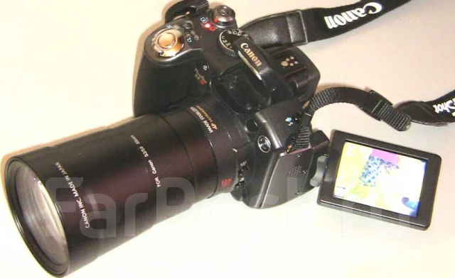 Canon PowerShot S5 IS. 8 - 8.9 ��, ���: 12� ����