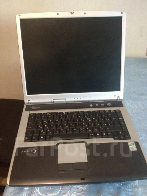 Fujitsu Siemens Amilo. 1,8����, ��� 1024 ��, ���� 40���, WiFi: 1, Bluetooth: 1, ����������� �� 3��. ����