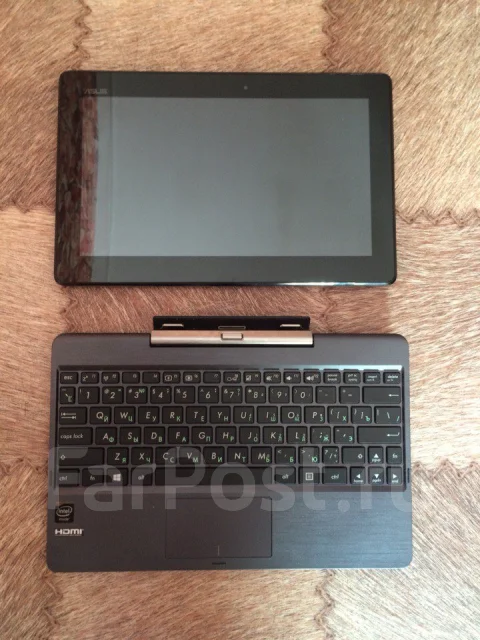 Asus Transformer Book. 1,5����, ��� 2048 ��, ���� 532���, WiFi: 1, Bluetooth: 1, ����������� �� 36��. ����