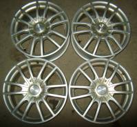 Bridgestone Alpha. 6.5x16, 5x100.00, 5x114.30, ET50, ЦО 73,1 мм.