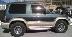 Замок двери. Mitsubishi Pajero