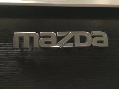 Эмблема. Mazda