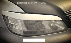 Накладка на фару. Mitsubishi Lancer