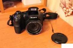 Sony Cyber-shot DSC-H100. 15 - 19.9 �� ����