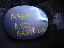 Лючок топливного бака. Mazda Axela, BK3P, BKEP, BK5P Mazda Mazda3, BK Mazda Mazda3 MPS, BK Двигатели: L3VDT, LFVE, LFDE, ZYVE, L3VE, MZR, MZCD, DISI...