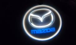 Проекция логотипа (эмблема) mazda