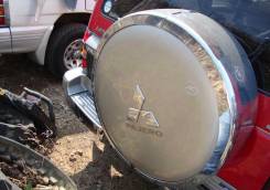 Колпак запасного колеса. Mitsubishi Pajero, V26W, V25W, V24V, V24W, V23W, V24WG, V21W, V26WG, V46WG, V26C, V25C, V24C, V23C, V43W, V45W, V46W, V46V