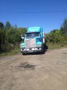 Freightliner. Тягач+полуприцеп, 11 000 куб. см., 52 000 кг.